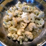 cauliflower florets browning in butter